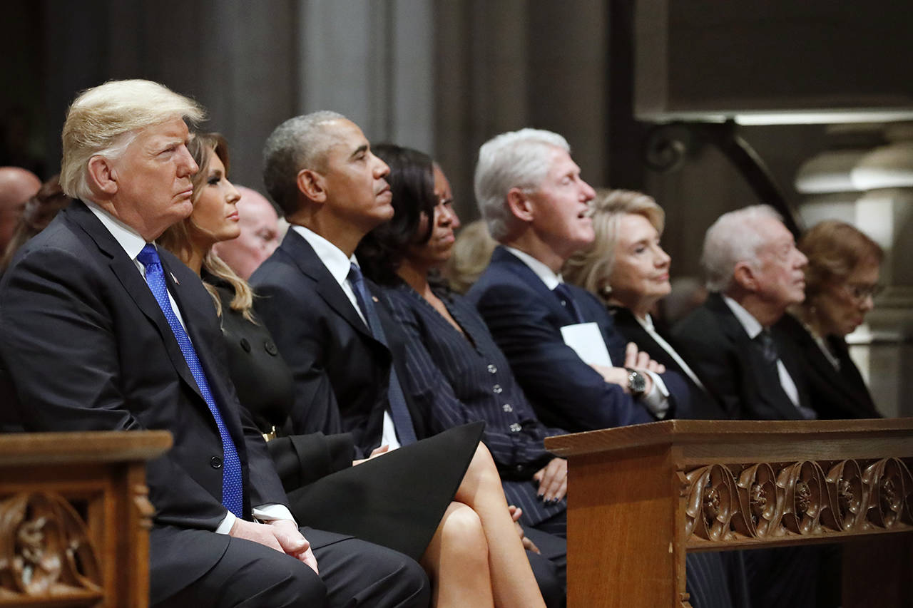 From left, President Donald Trump, first lady Melania Trump, former President Barack Obama, Michelle Obama, former President Bill Clinton, former Secretary of State Hillary Clinton and former President Jimmy Carter listen as former President George W. Bush speaks during a State Funeral at the National Cathedral on Wednesday in Washington for former President George H.W. Bush.(AP Photo/Alex Brandon, Pool)