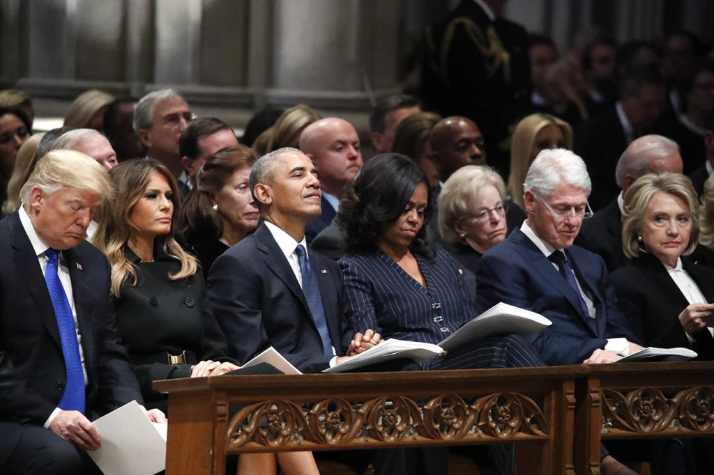 From left, President Donald Trump, first lady Melania Trump, former President Barack Obama, Michelle Obama, former President Bill Clinton and former Secretary of State Hillary Clinton listen during a State Funeral at the National Cathedral on Wednesday in Washington for former President George H.W. Bush. (AP Photo/Alex Brandon, Pool)
