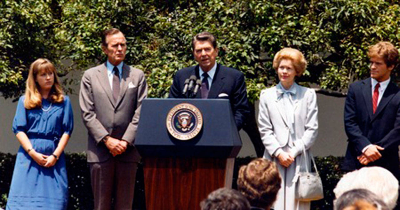 Ronald Reagan presents the Presidential Medal of Freedom posthumously to Henry M. “Scoop” Jackson’s family in 1984. Left to right are Anna Marie Jackson, George H.W. Bush, Helen Jackson and Peter Jackson. (Courtesy of The Henry M. Jackson Foundation)