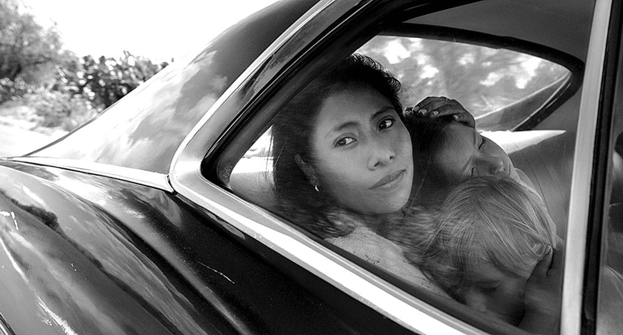 Yalitza Aparicio as Cleo, Marco Graf as Pepe and Daniela Demesa as Sofi in Alfonso Cuarón’s “Roma.” (Netflix)