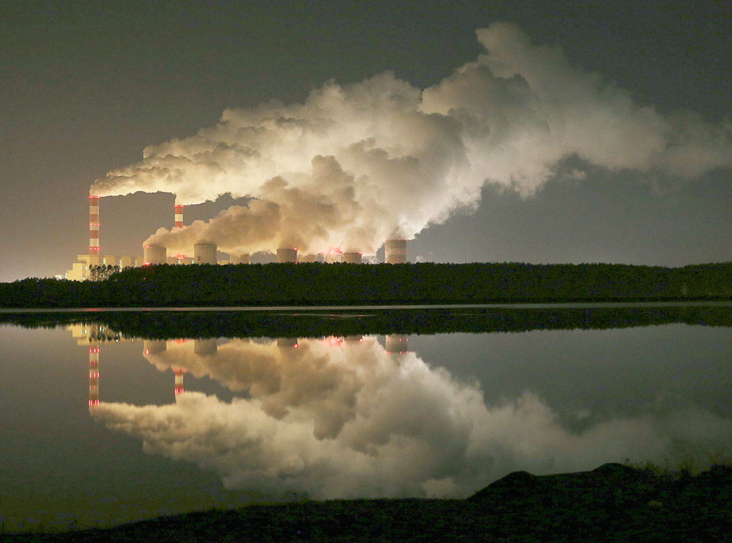 Plumes of smoke rise Nov. 28 from Europe’s largest lignite power plant in Belchatow, central Poland. After several years of little growth, global emissions of heat-trapping carbon dioxide surged in 2018 with the largest jump in seven years, discouraged scientists announced Wednesday. (AP Photo/Czarek Sokolowski)
