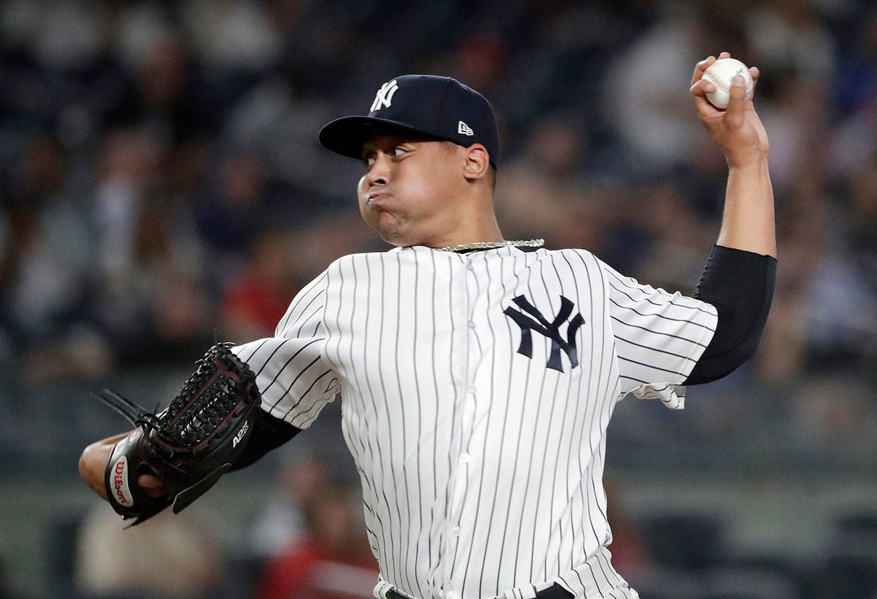 Justus Sheffield, seen here pitching for the Yankess on Sept. 19, 2018, was acquired by the Mariners in a deal for James Paxton on Nov. 20, 2018. (AP Photo/Julio Cortez)