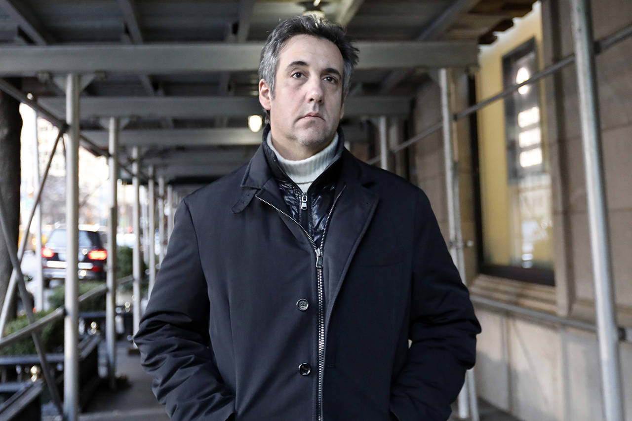 Michael Cohen, former lawyer to President Donald Trump, leaves his apartment building on New York’s Park Avenue on Friday. (AP Photo/Richard Drew)
