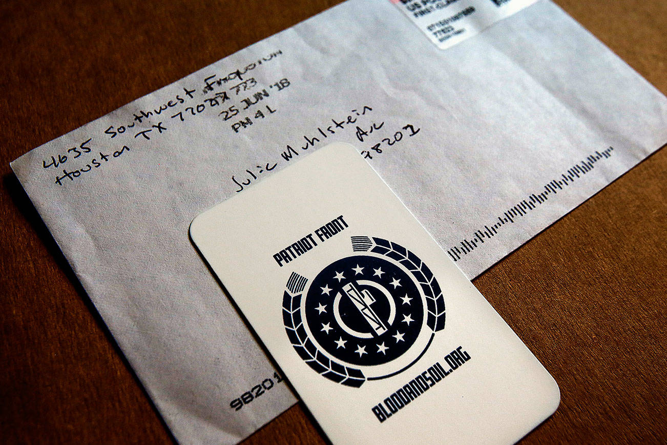 Herald columnist Julie Muhlstein received this card, by mail at her Everett home, from the Texas-based neo-Nazi organization Patriot Front. The mail came in June, a month after Muhlstein wrote about the group’s fliers being posted at Everett Community College and in her neighborhood. (Dan Bates / The Herald)