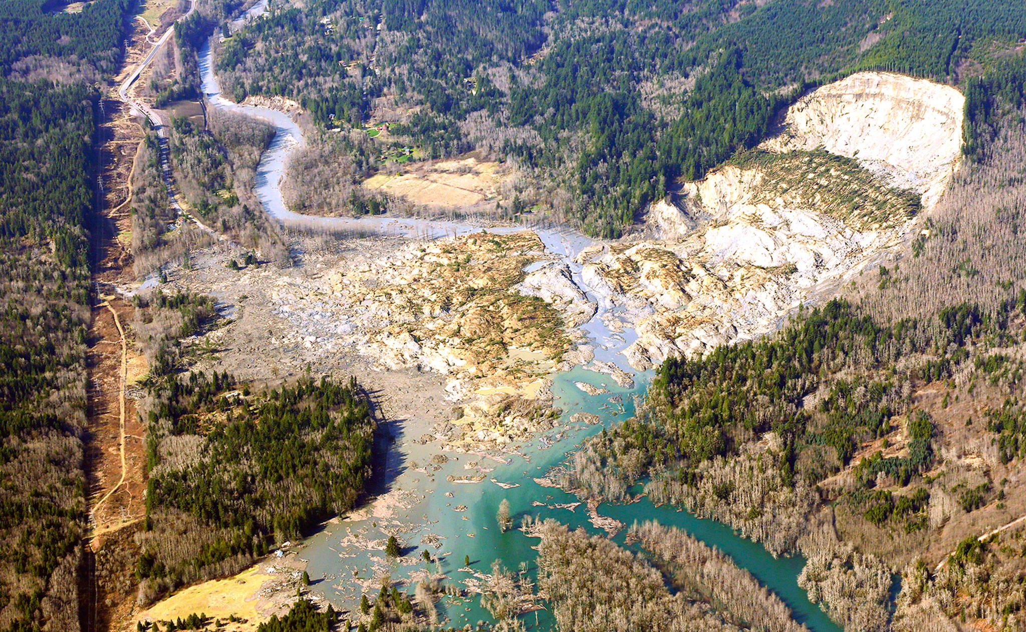 The massive mudslide that killed 43 people, as seen from the air a few days after the disaster near Oso. (AP File/Ted S. Warren)