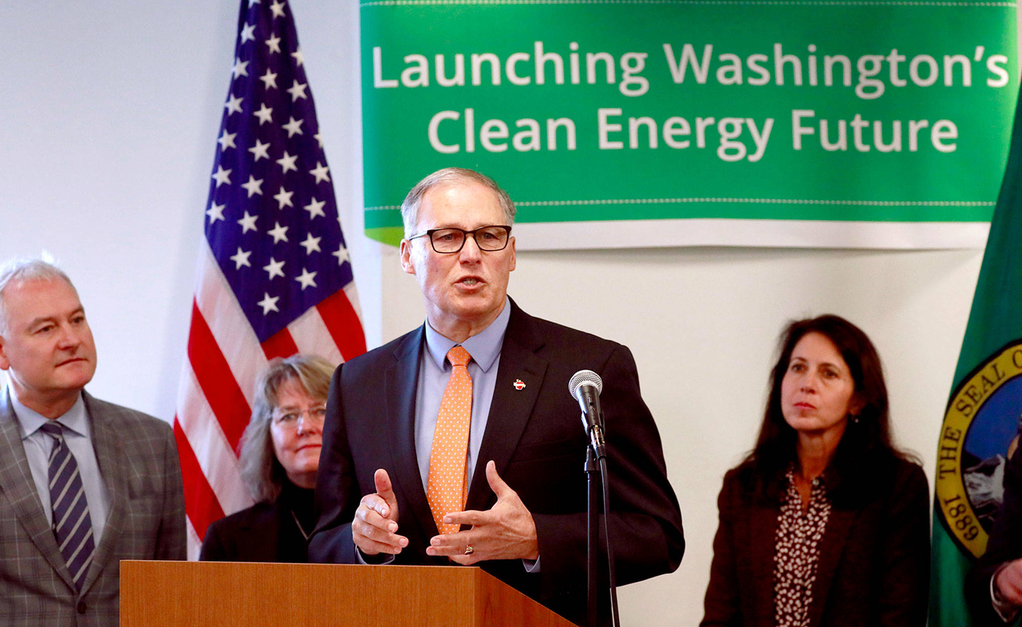 Washington Gov. Jay Inslee speaks about tackling climate change during a news conference in Seattle on Monday. (Erika Schultz/The Seattle Times via AP)