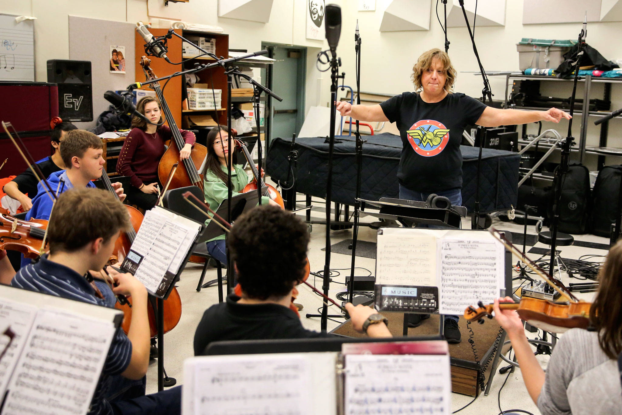Jennifer Schillen leads the Mountlake Terrace High School Chamber Orchestra through a rehearsal before recording at Edmonds Community College. (Kevin Clark / The Herald)