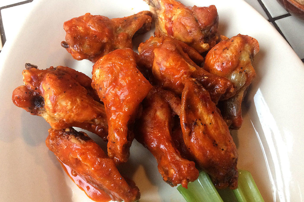 Diamond Knot’s brewpub wings are plenty spicy if you order them with the extra spicy buffalo sauce. (Evan Thompson / The Herald)
