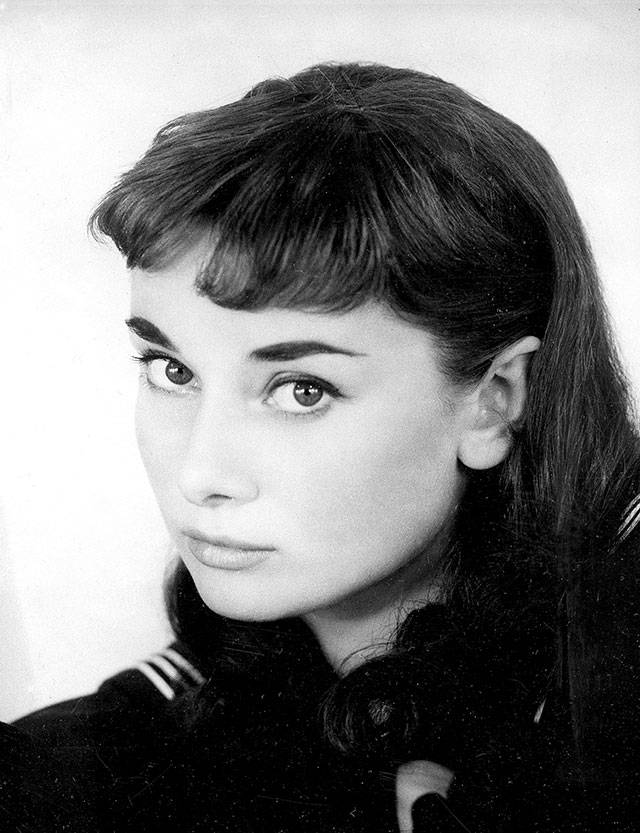 Audrey Hepburn poses in character in her Broadway debut, “Gigi,” in 1951. (Associated Press)
