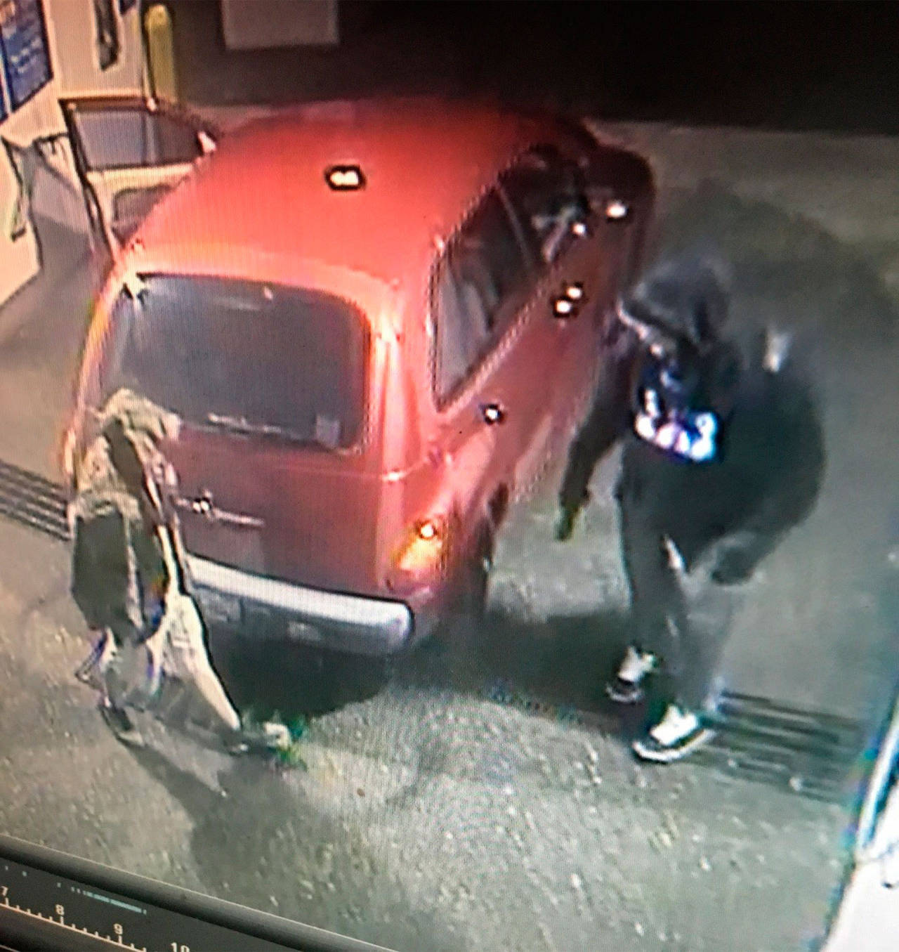 An image from surveillance video shows suspects involved in an Aug. 5 shooting at the Brown Bear Car Wash on 164th Street SW in Lynnwood. (Snohomish County Sheriff’s Office)