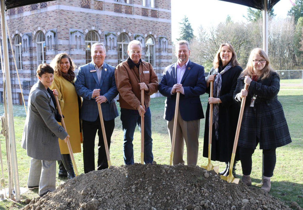 Kevin Daniels poses with Bastyr University representatives, including Jeanne Galloway and Harlan Patterson, at the ceremonial groundbreaking for the Lodge at Saint Edward Park on Dec. 7. (Katie Metzger / Bothell-Kenmore Reporter)
