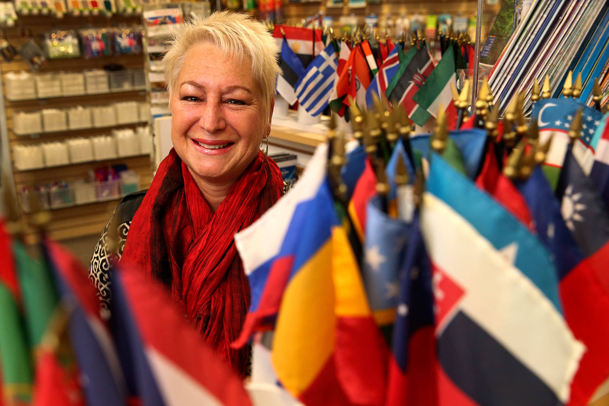Petra Rousu, originally from Germany, is the owner of The Savvy Traveler in Edmonds. (Kevin Clark / The Herald)