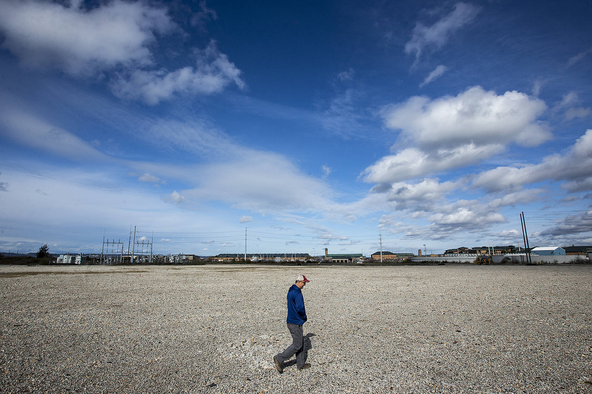 Bryan Lust, site manager for Kimberly-Clark, walks across the 67-acre former site of the company’s Everett mill in March 2017. (Ian Terry / Herald file)