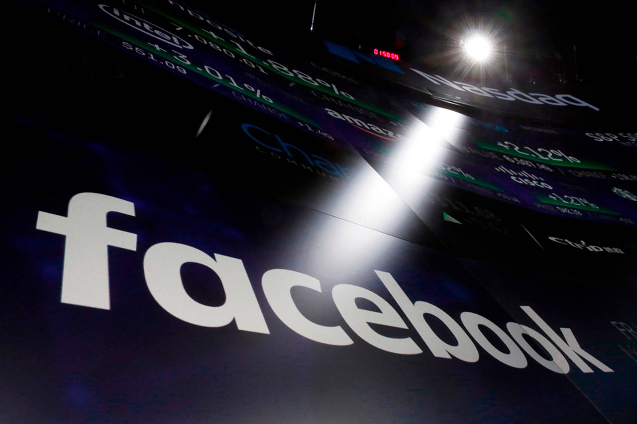 Facebook said Friday that a software bug may have exposed a broader set of photos to app developers than users had granted permission for. (AP Photo/Richard Drew, File)