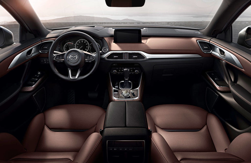 The 2019 Mazda CX-9 Signature model’s interior has Auburn-colored Nappa leather seating surfaces, Santos Rosewood trim and aluminum accents. (Manufacturer photo)
