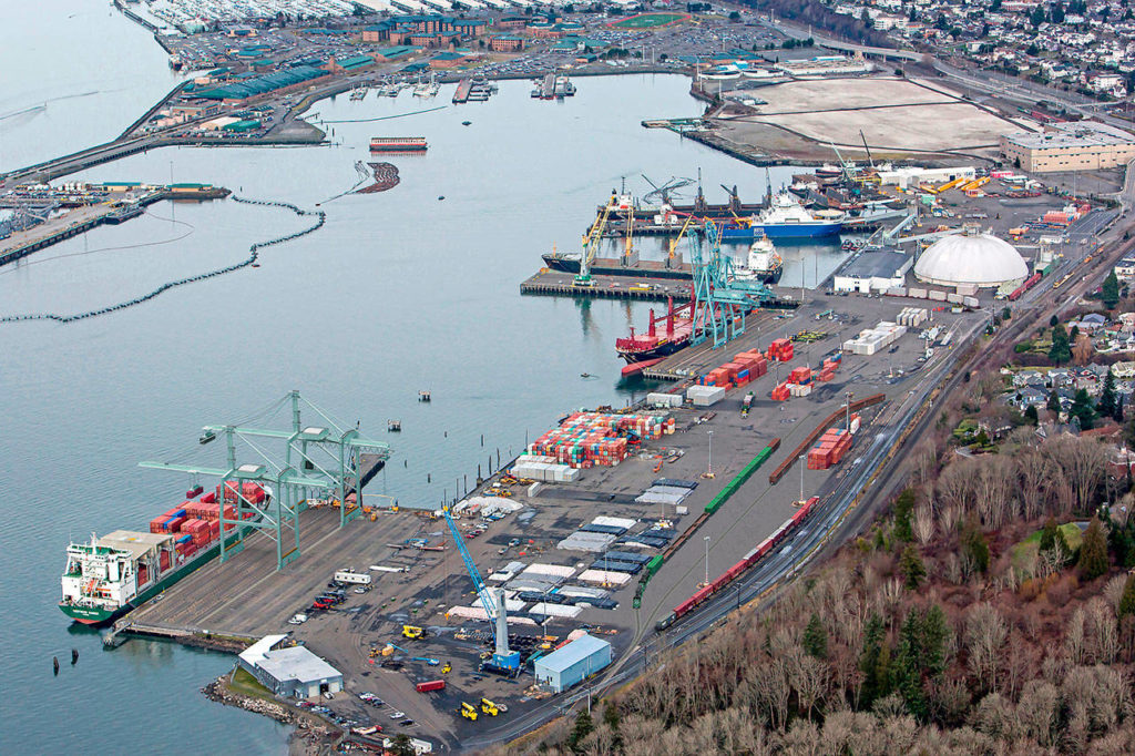 The Port of Everett plans to modernize the south terminal wharf to allow for larger ships and heavier cargo. This artist’s rendering shows the project, including two new 100-foot cranes to the far left. (Port of Everett)
