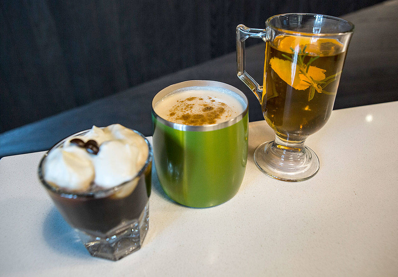 From left, a coffee bourbon warmer, a vanilla vodka chai and an autumnal cider toddy at Scratch Distillery. (Olivia Vanni / The Herald)