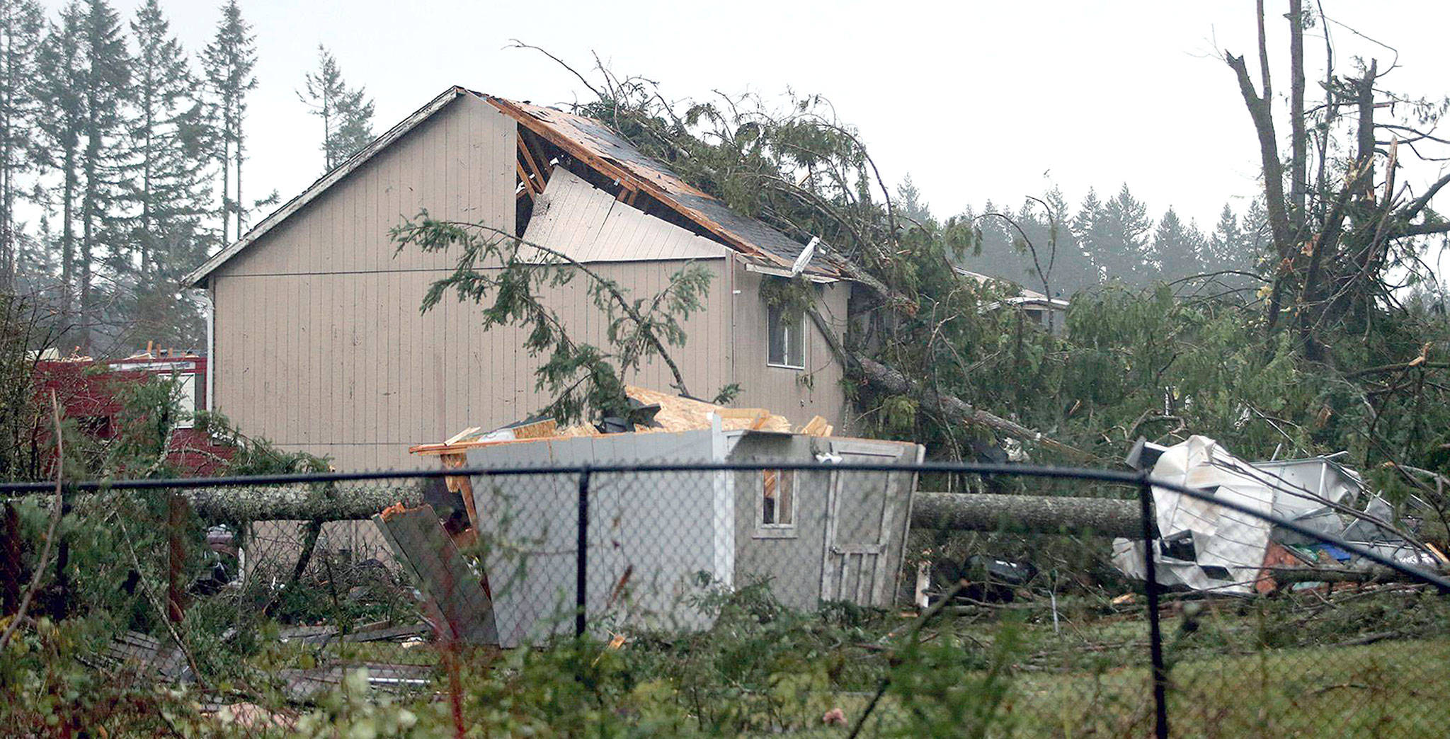 This is among the homes that were damaged in Port Orchard on Tuesday when a rare tornado touched down. (Larry Steagall/Kitsap Sun via AP)