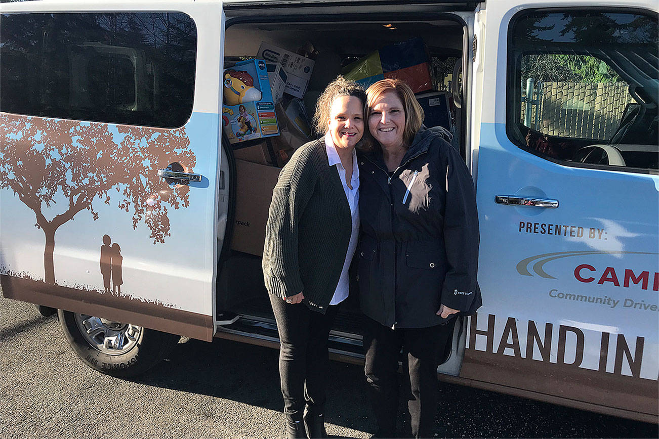 Vans of donations help make foster family Christmas special