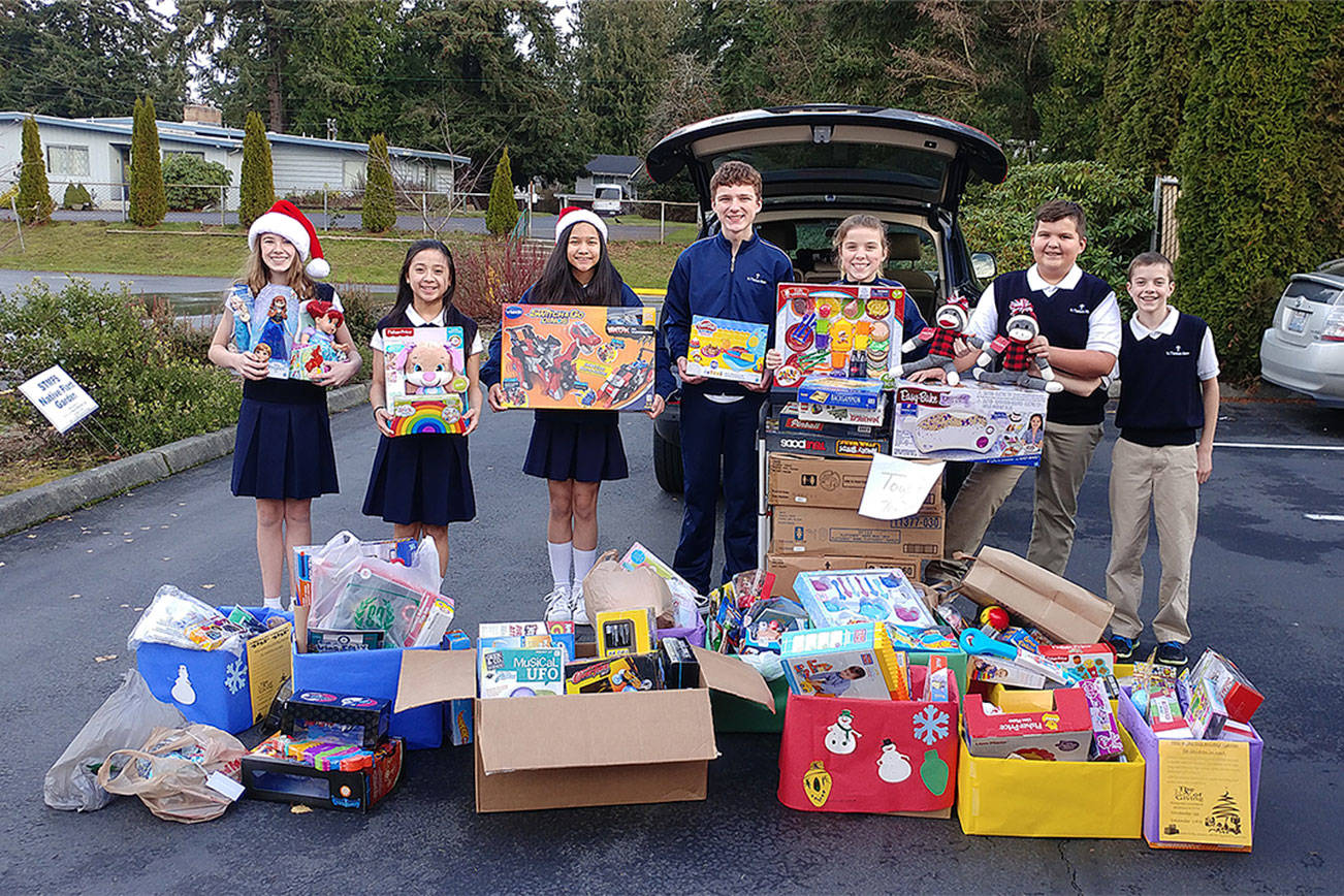 Students bring in new toys for Catholic Community Services