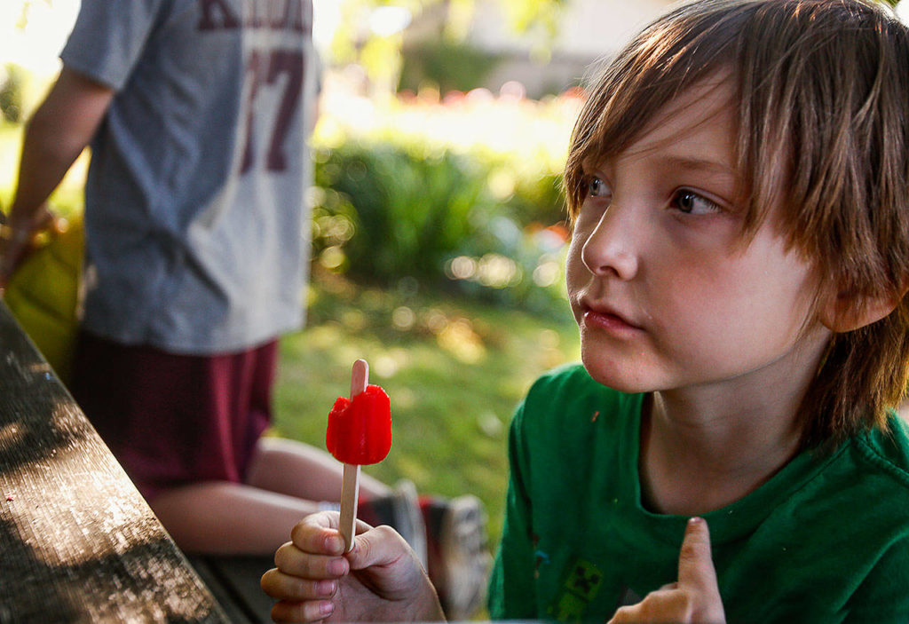 Quintin Hall, 8, at a goodbye party last summer in Woodway, where he and his mom stayed while he underwent cancer treatment at Seattle Children’s Hospital. (Dan Bates / The Herald)
