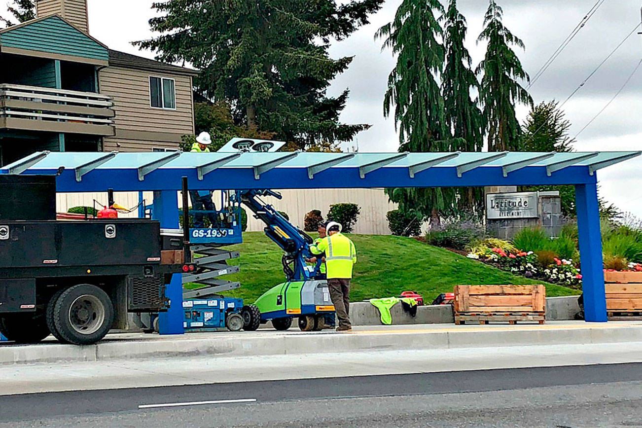 Crews work on a new Swift Green Line station on Airport Road at Gibson Road in this photo from July. (Community Transit photo)