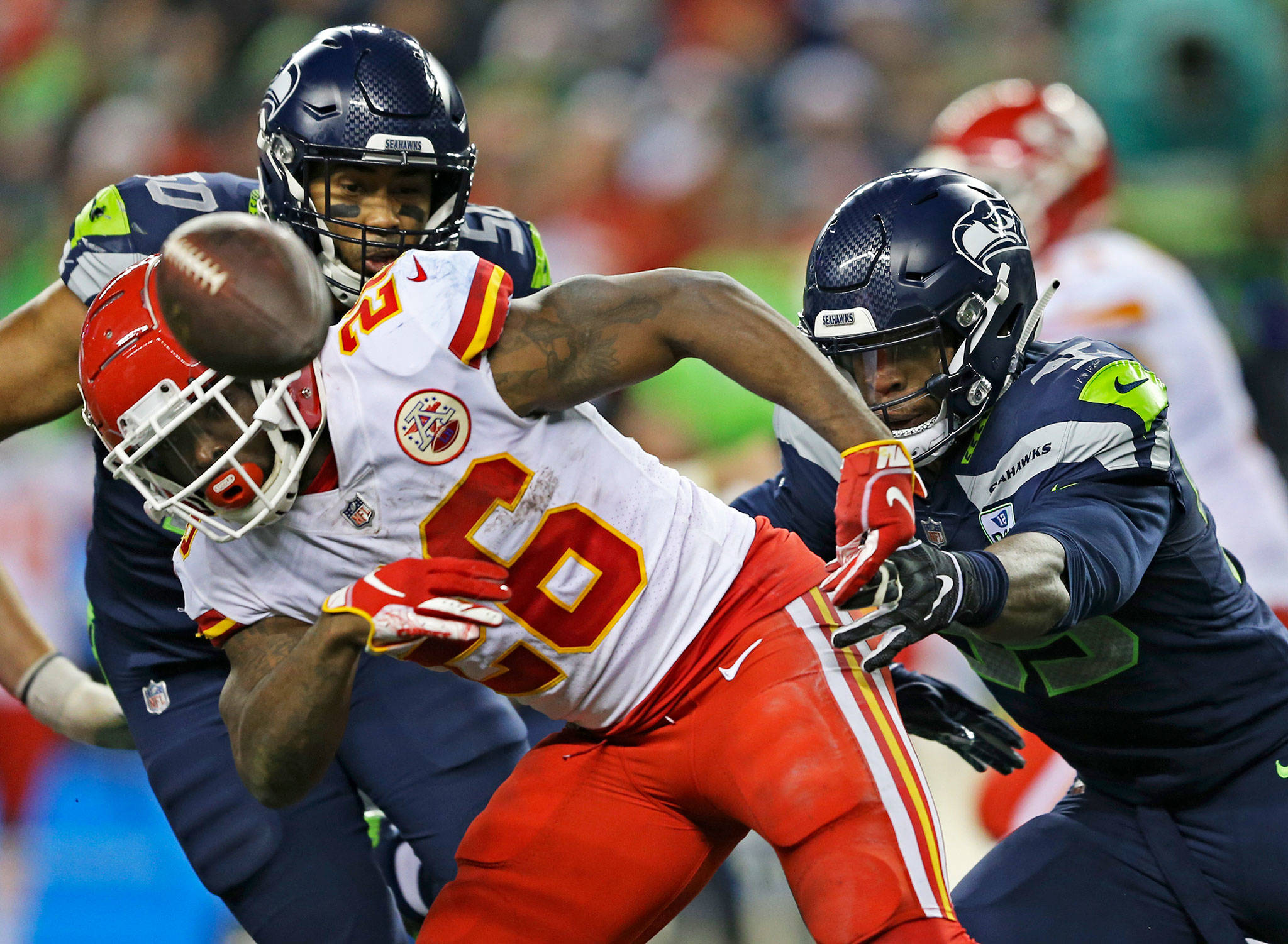 Kansas City running back Damien Williams fumbles the ball during Sunday’s game in Seattle. The Seahawks recovered two fumbles in their 38-31 win. (Olivia Vanni / The Herald)