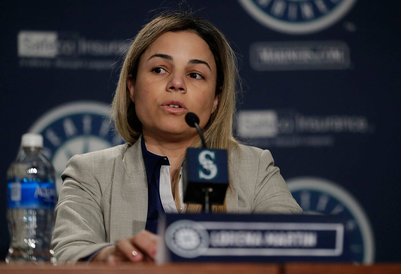 In this Jan. 25, 2018, photo, Lorena Martin, then the Seattle Mariners’ director of high performance, speaks during the team’s annual media briefing before baseball spring training. Martin has filed a wrongful-termination lawsuit alleging discriminatory treatment. The Mariners have denied the allegations. (AP Photo/Ted S. Warren)