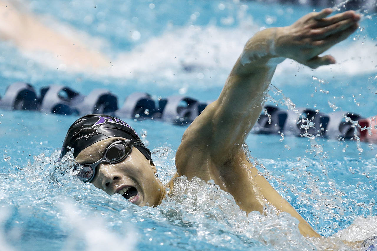 Kamiak’s Maxwell Fang swims to third place in the 200-yard freestyle at the 4A State Boys Swimming and Diving Championship at the King County Aquatic Center in Federal Way on Feb. 17. Ian Terry / The Herald