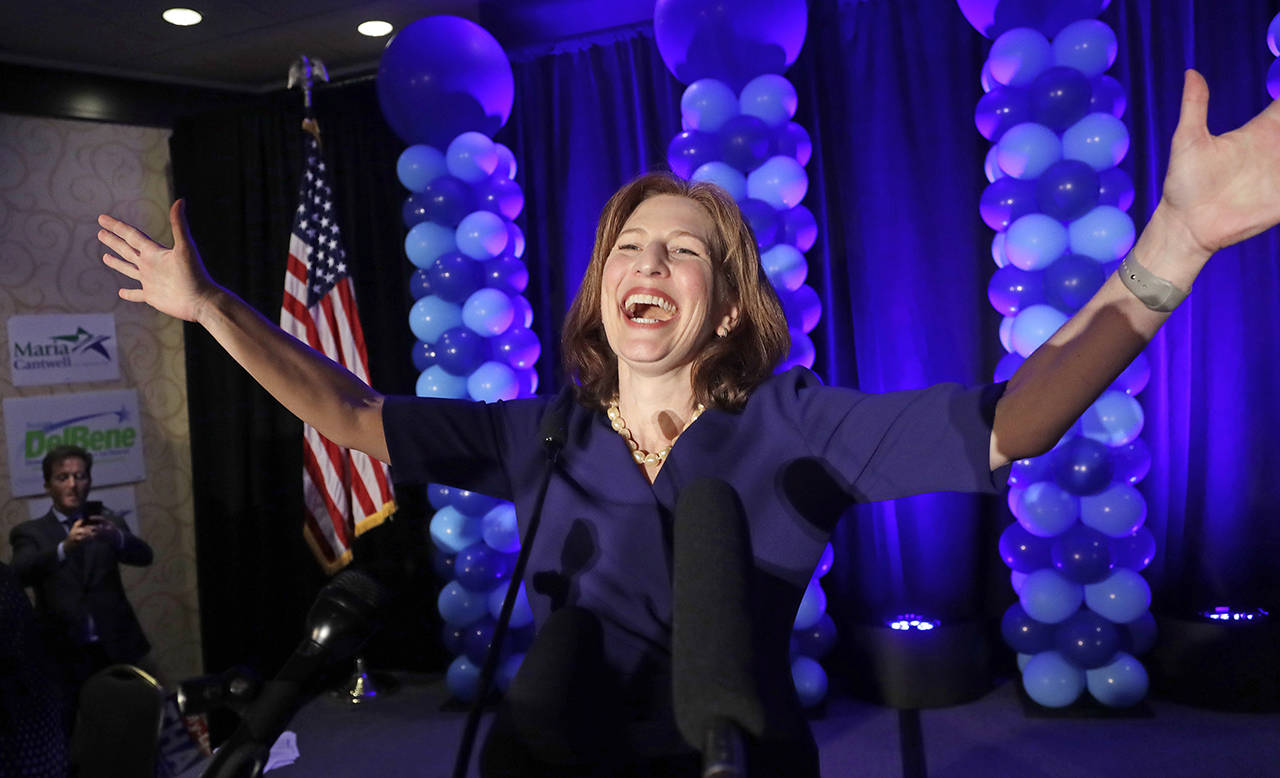 In this Nov. 6, 2018 photo, Congressional candidate Kim Schrier addresses the crowd at an election night party for Democrats, in Bellevue. (AP Photo/Elaine Thompson, File)