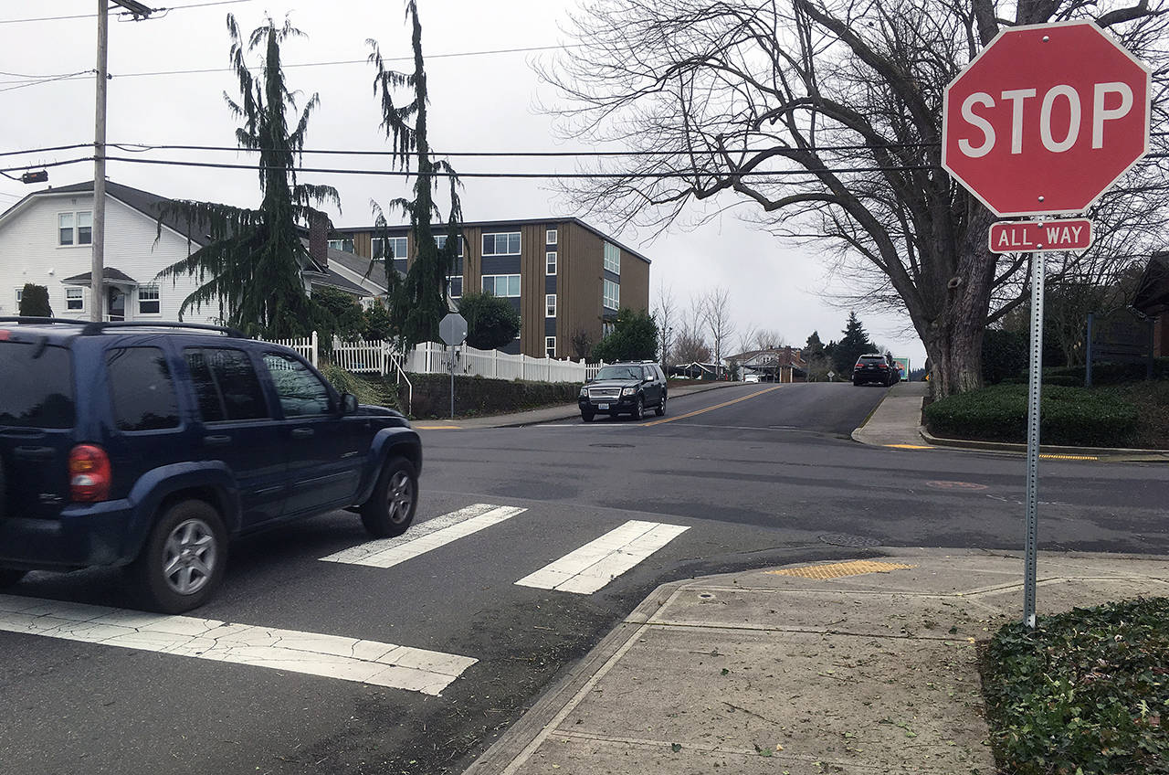 State law requires a full stop before any marked stop line. (Sue Misao / The Herald)