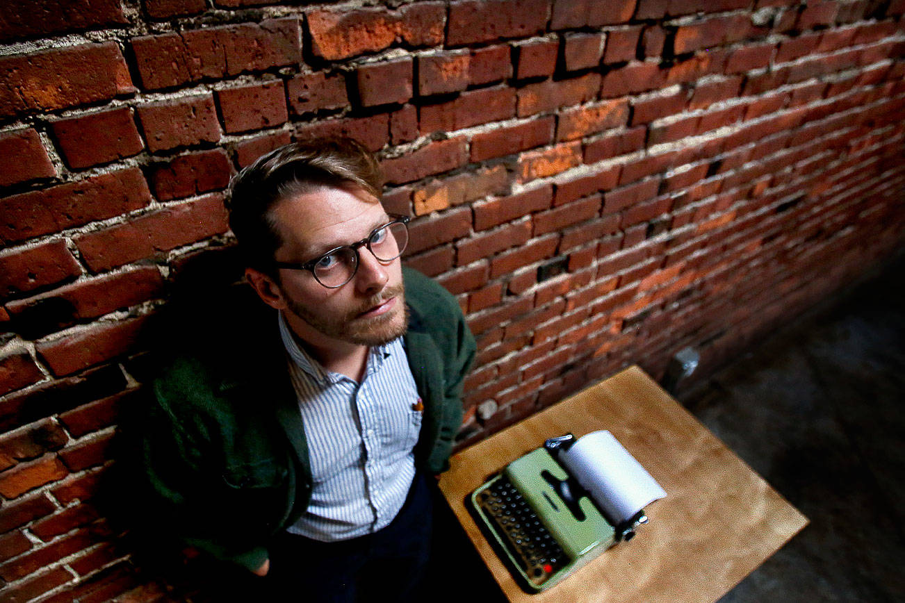 Everett writer Richard Porter has a new book, &quot;Smokestackers!&quot; The short book is about what he calls the &quot;common folklore&quot; of Everett. (Dan Bates / The Herald)