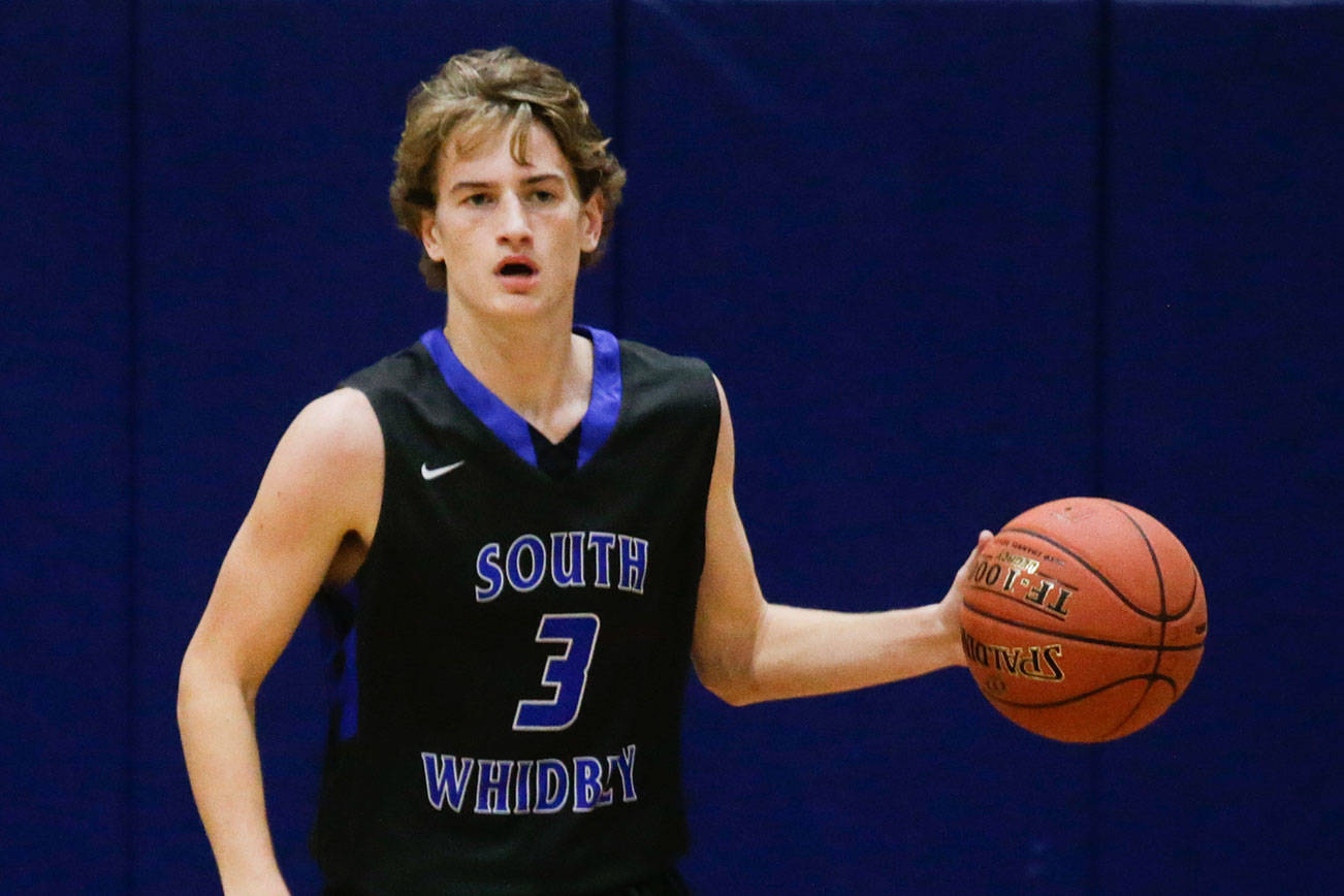 South Whidbey’s Kody Newman goes for a layup against Cedar Park Christian on Friday, Jan. 11, 2019 in Bothell, Wa. (Andy Bronson / The Herald)