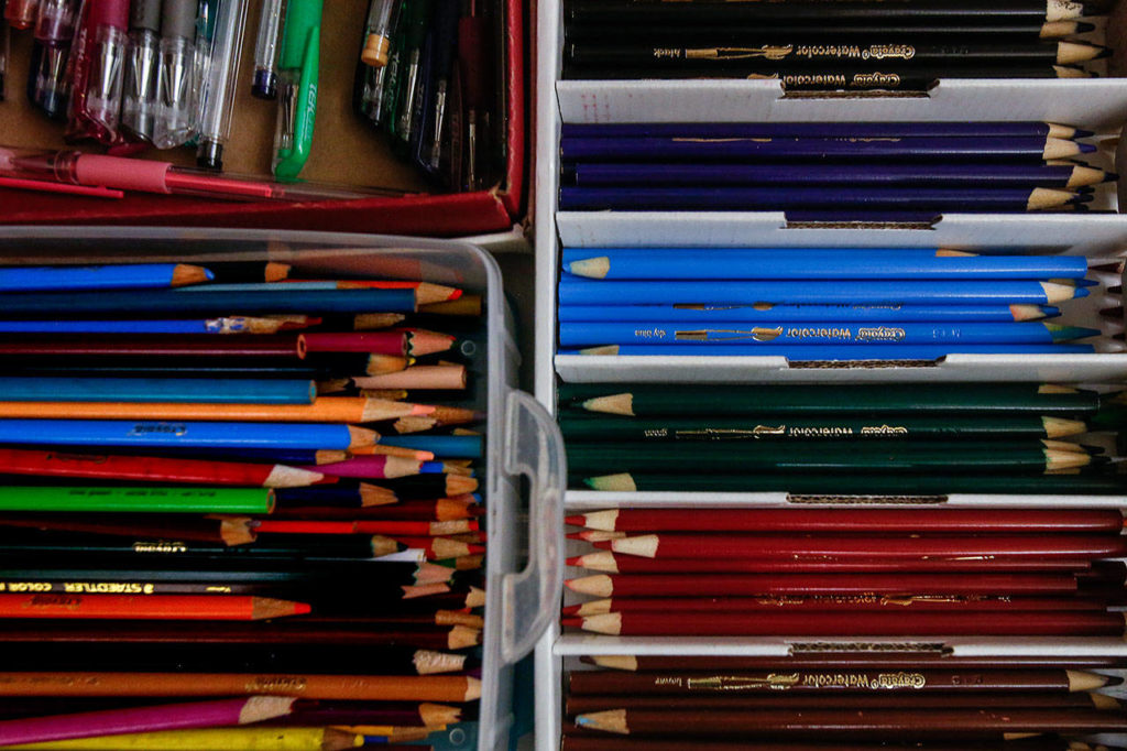 An assortment of colored pencils as well as pens have been provided for coloring at the library. Some supplies were donated by Friends of the Library. (Dan Bates / The Herald)

