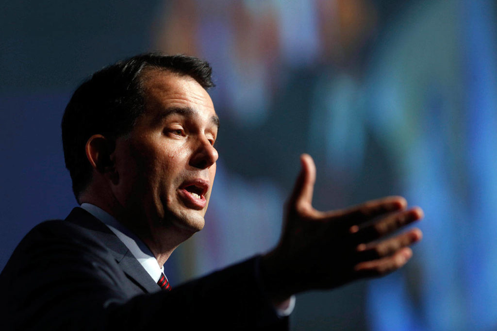 GOP presidential candidate Scott Walker, governor of Wisconsin, speaks in Des Moines, Iowa, Sept. 19, 2015. Walker is leaving a fundamentally altered Wisconsin on Monday after eight years as governor. (Michael Zamora/The Des Moines Register via AP, File)
