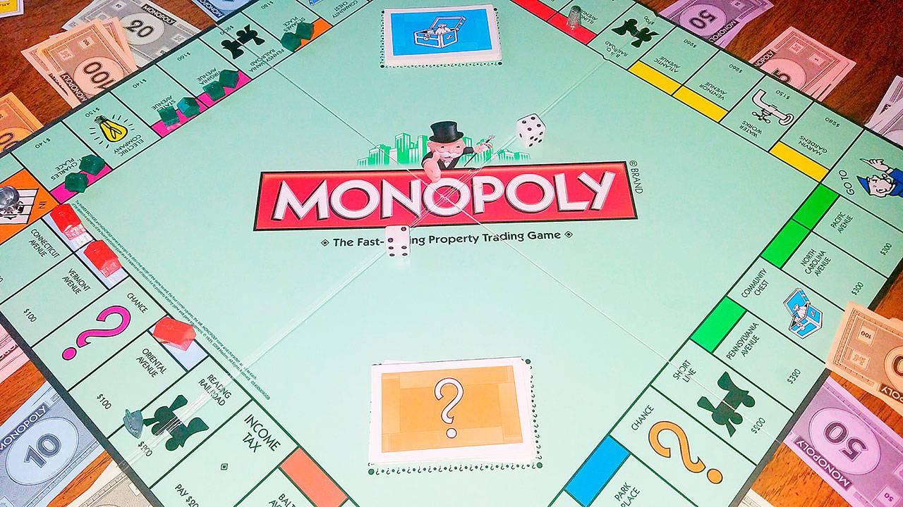 Generation after generation, Monopoly brings families together for games that seemingly never end. (Jennifer Bardsley)