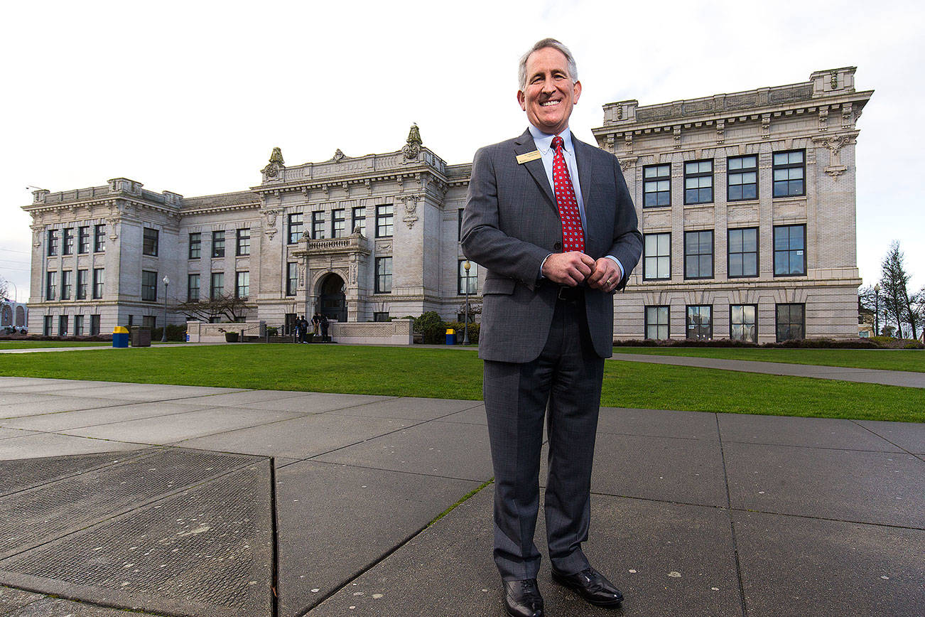 Everett School District Superintendent Gary Cohn poses in front of Everett High School on Thursday, Jan. 10, 2019 in Everett, Wa. Cohn is retiring after 39 years in education. (Andy Bronson / The Herald)