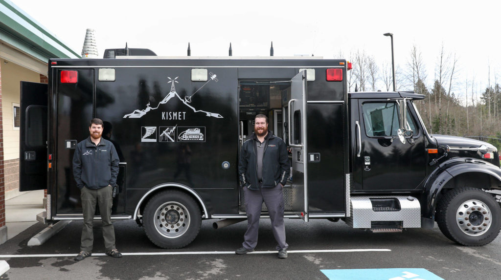 Kyle Burgess (left) and Matt Benjamin were named city of Marysville volunteers of the month in November. The Kismet is a mobile communciation hub the pair has outfitted. (Lizz Giordano / The Herald)
