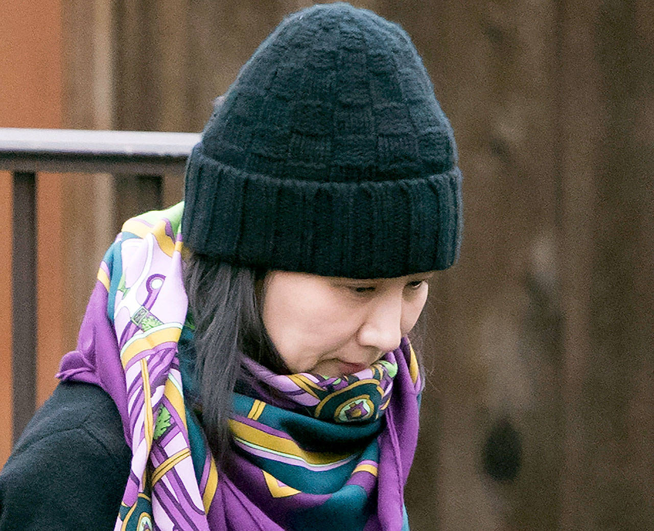 Huawei chief financial officer Meng Wanzhou leaves her home in Vancouver, British Columbia, last month. A Chinese court has sentenced a Canadian man to death in a sudden retrial in a drug smuggling case that is likely to escalate tensions between the countries over the arrest of the top Chinese technology executive. (Jonathan Hayward/The Canadian Press via AP, File)