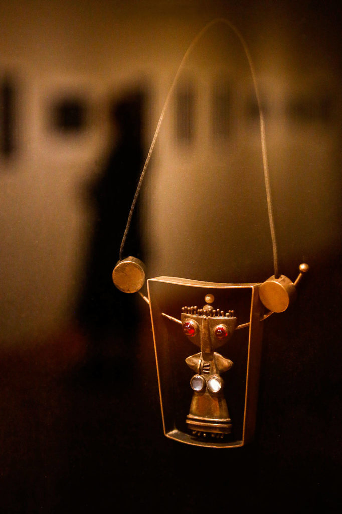 A necklace by Russell Day, made of sterling silver, moonstone and garnets, is on view in the gallery named in his honor on the EvCC campus. Day died Monday at age 106. (Dan Bates / The Herald)
