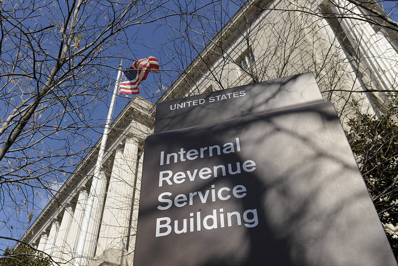 The Internal Revenue Service is recalling about 46,000 of its employees furloughed by the government shutdown, nearly 60 percent of its workforce, to handle tax returns and pay out refunds. The employees won’t be paid. (AP Photo/Susan Walsh, File)