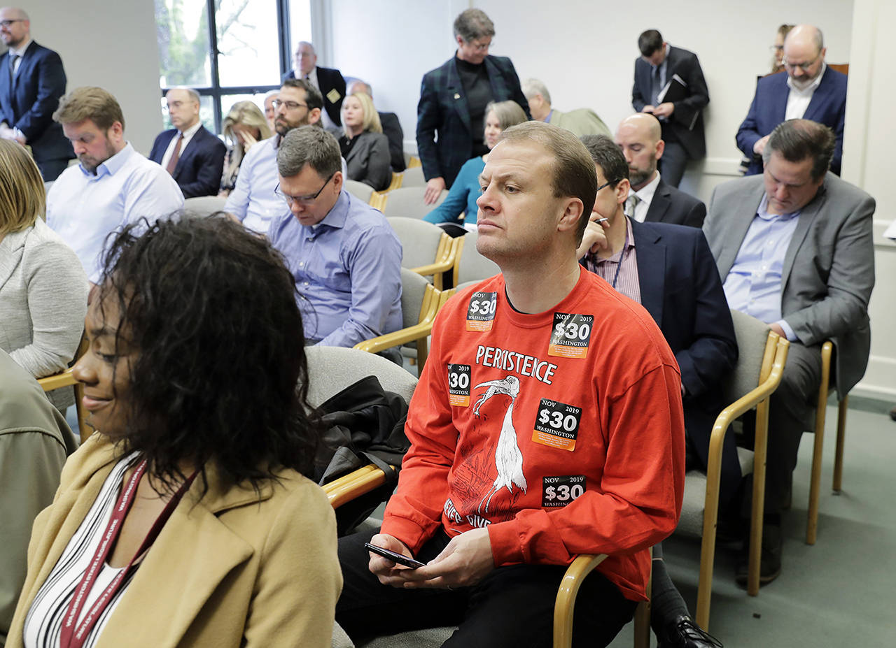 In this Jan. 10 photo, Tim Eyman, of Mukilteo, attends the Associated Press Legislative Preview at the Capitol in Olympia. A Thurston County judge cleared the way Friday for the state to add new campaign finance violations into its lawsuit against Eyman. (AP Photo/Ted S. Warren, file)