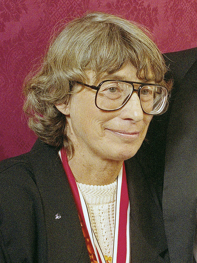 In this 1992 photo, Mary Oliver appears at the National Book Awards in New York where she received the poetry award for her book “New and Selected Poems.” (AP Photo/Mark Lennihan, File)