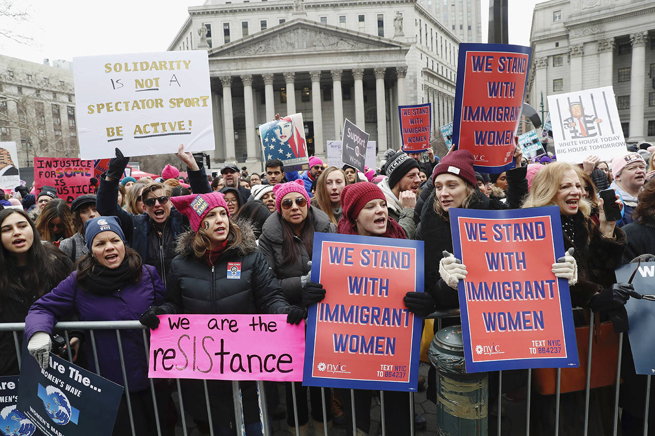 Participants take part in a Women’s rally in lower Manhattan on Saturday in New York. (AP Photo/Kathy Willens)