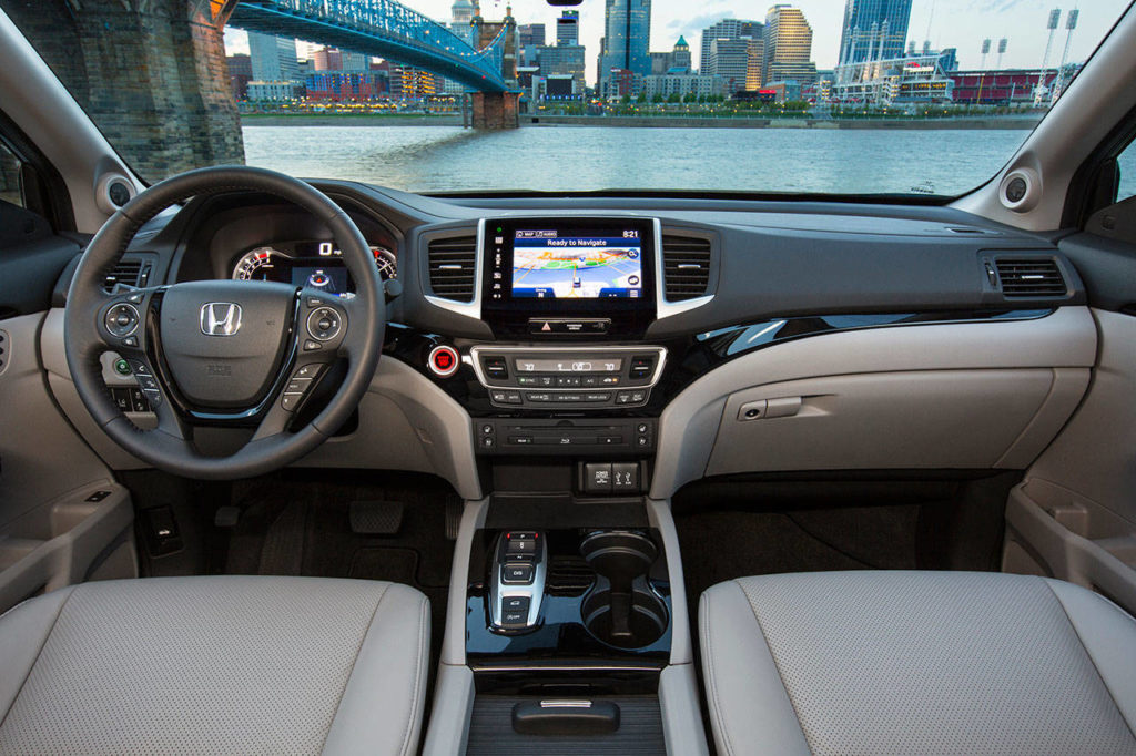 The 2019 Honda Pilot has a new display audio system with an 8-inch touchscreen. The system is standard on EX, EX-L, Touring and Elite trim levels. The Elite interior is shown here. (Manufacturer photo)
