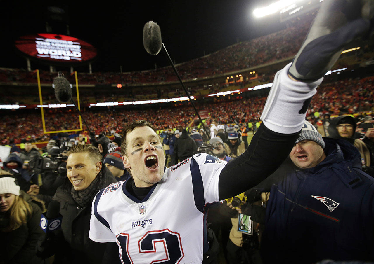 New England Patriots quarterback Tom Brady (12) celebrates after defeating the Kansas City Chiefs in the AFC Championship Sunday in Kansas City, Mo. (AP Photo/Jeff Roberson)