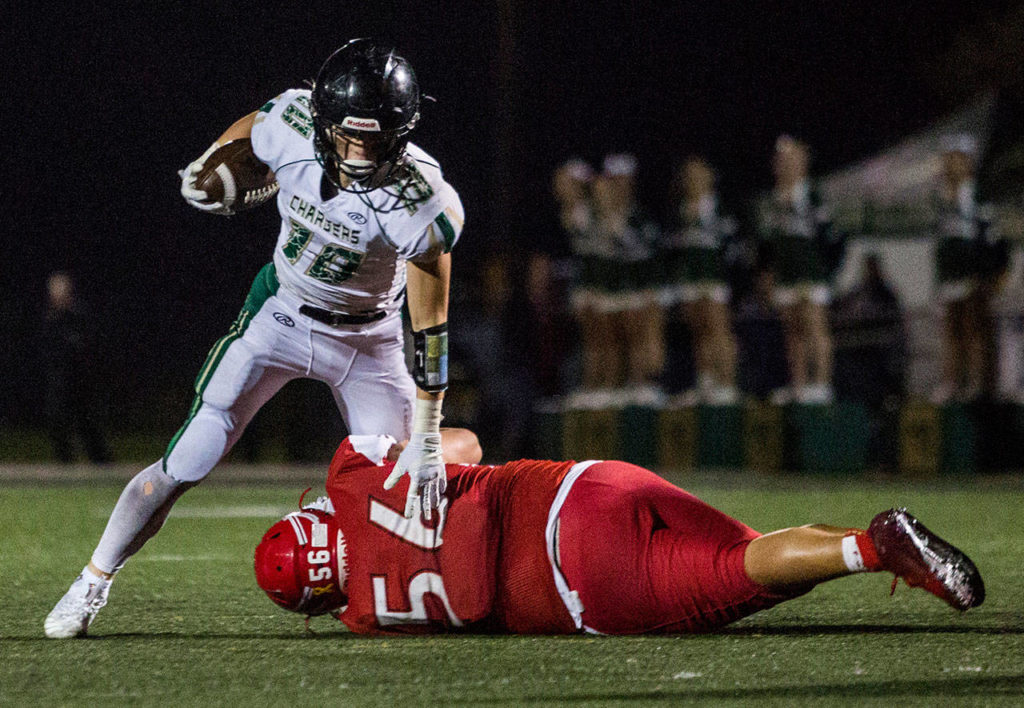 Marysville Getchell running back Ryan King (top) is tackled by Marysville Pilchuck’s Lincoln Davis during a game on Oct. 5, 2018, in Marysville. (Olivia Vanni / The Herald)
