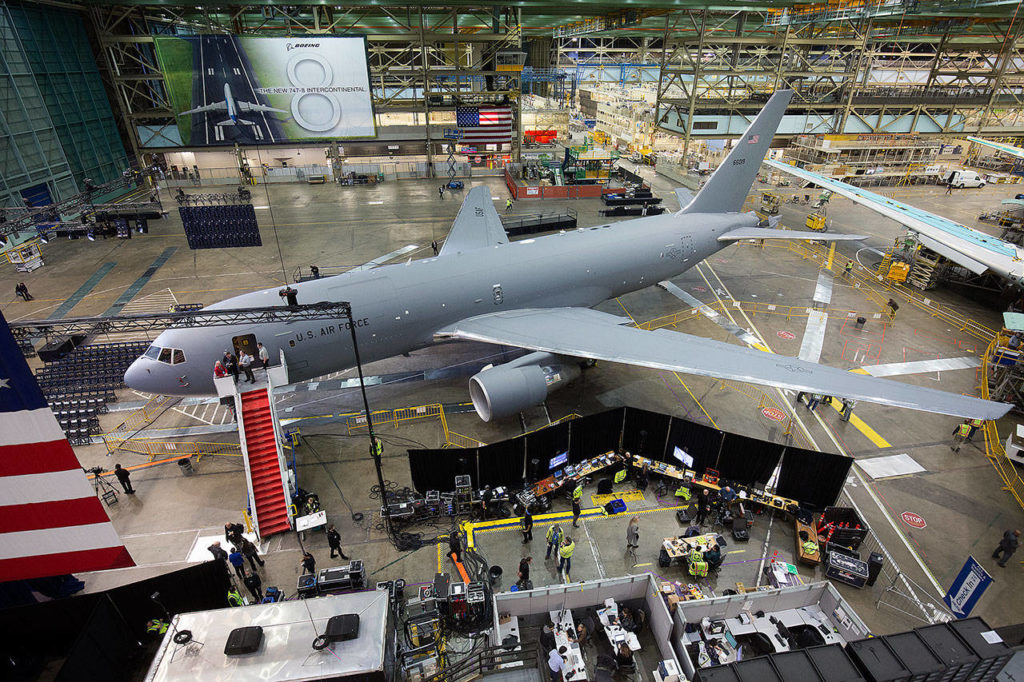 Boeing workers get in place for the KC-46 Pegasus delivery event in the Boeing factory at Paine Field in Everett on Thursday. (Andy Bronson / The Herald) 
