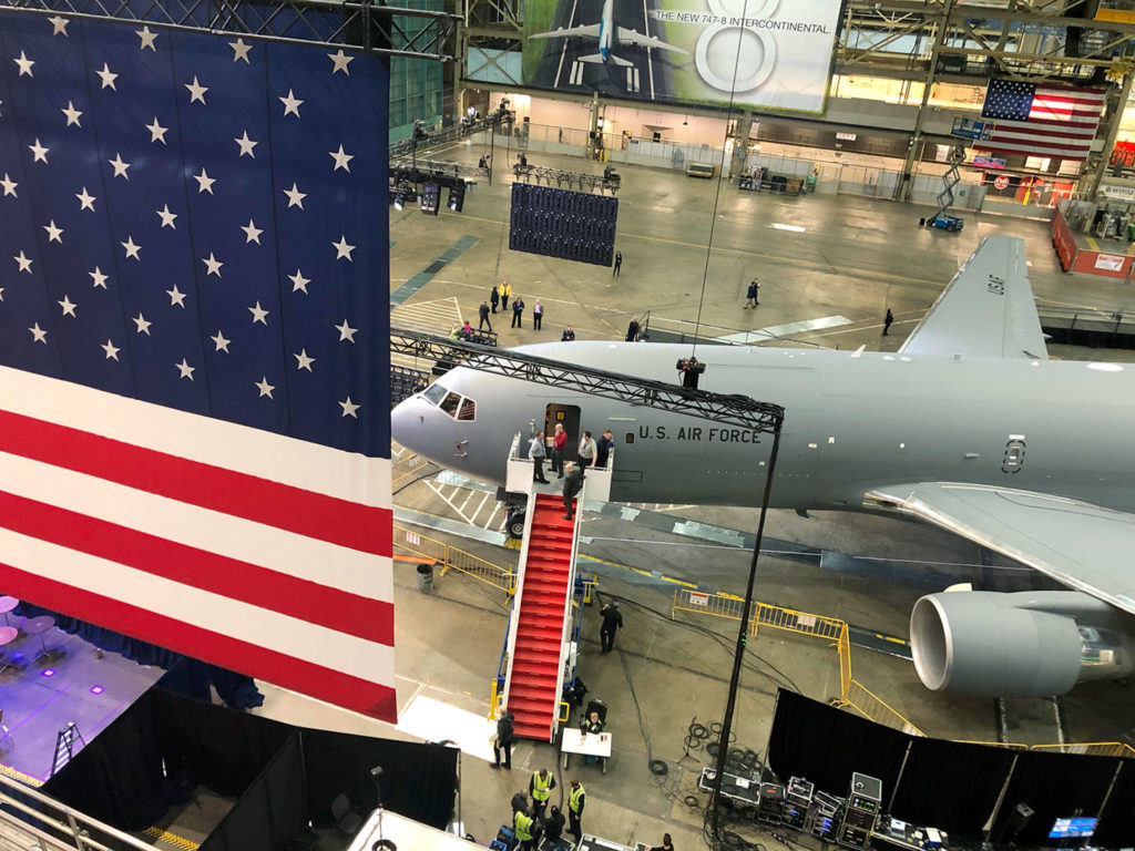 One of the first two KC-46 Pegasus tankers to be delivered to the U.S. Air Force is readied for a ceremony Thursday inside the main Boeing plant at Paine Field in Everett. (Andy Bronson / The Herald)
