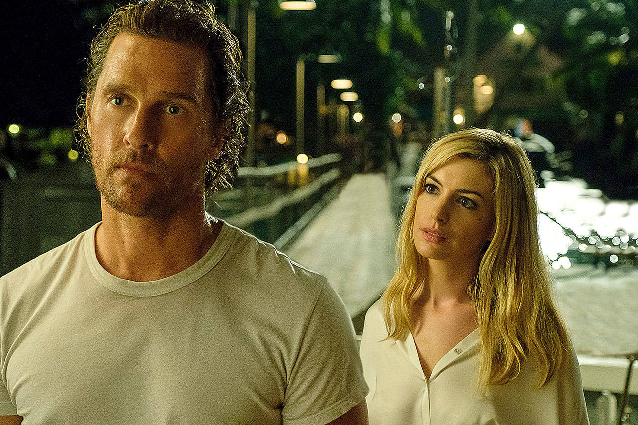 Karen (Anne Hathaway) is scheming with ex-husband Baker Dill (Matthew McConaughey) in “Serenity,” a movie with an audacious plot twist. (Photo by Graham Bartholomew/Aviron Pictures)